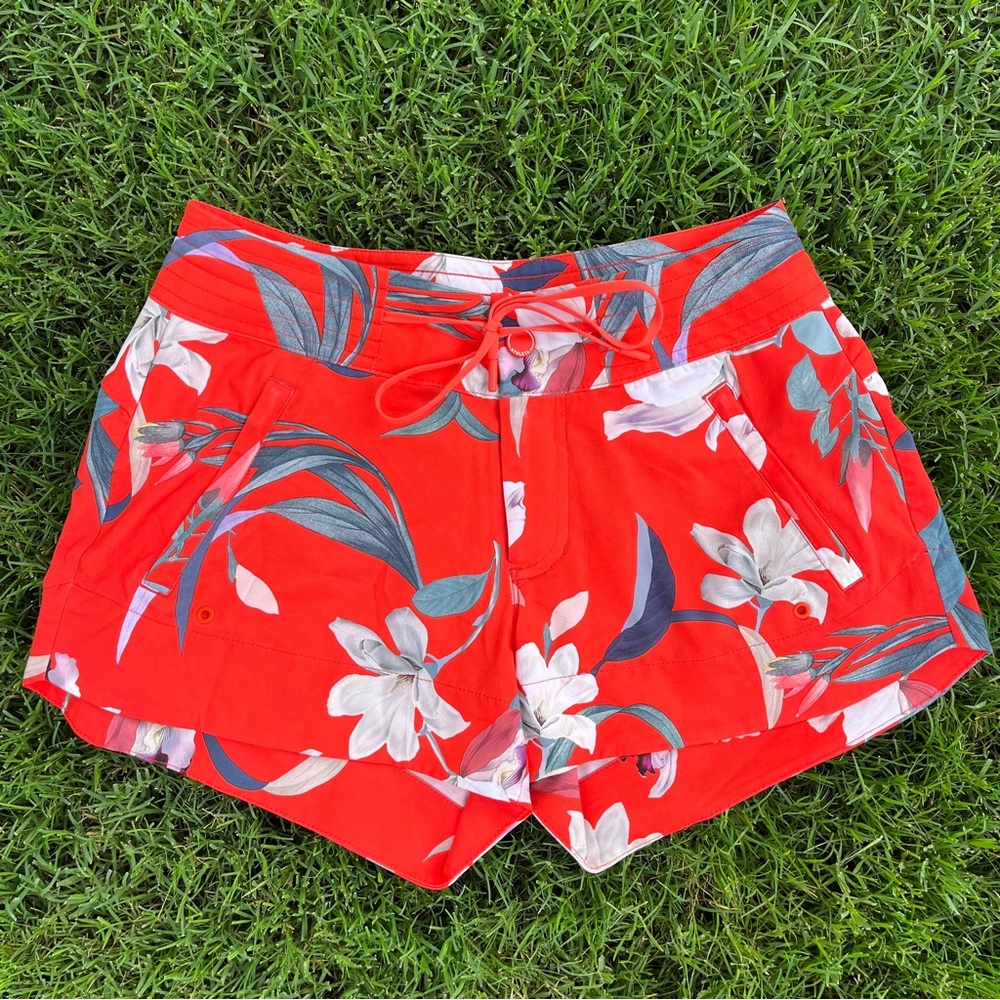 Orange floral Athleta swim shorts